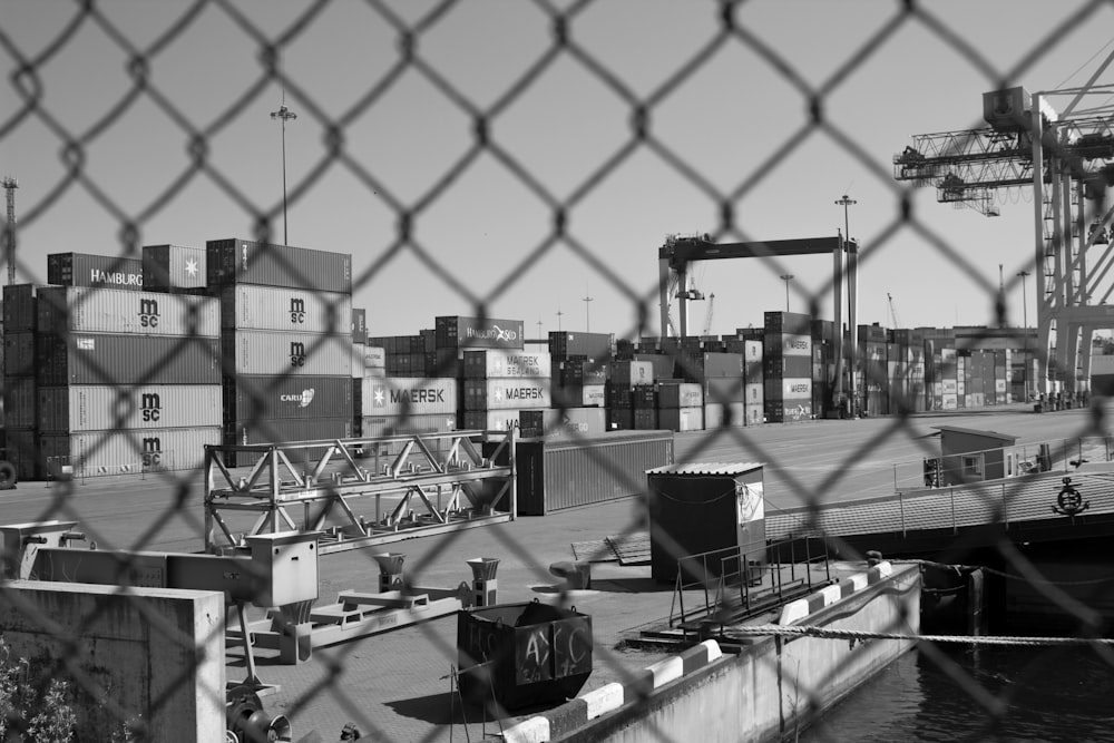 white metal fence near building during daytime