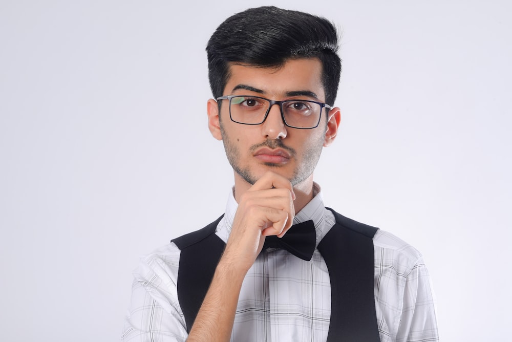 man in white dress shirt wearing eyeglasses