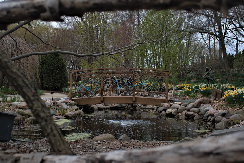 brown wooden bridge over river