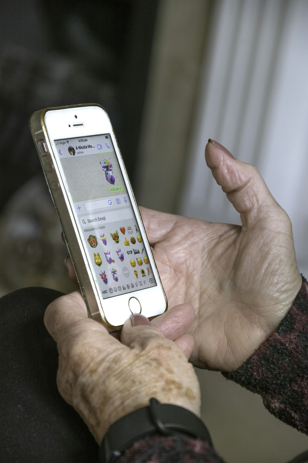 person holding silver iphone 6