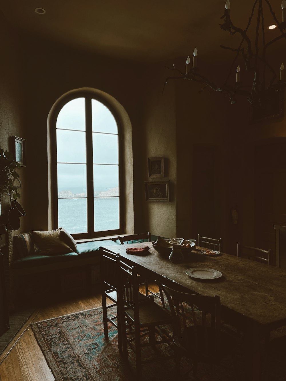 black wooden table near window