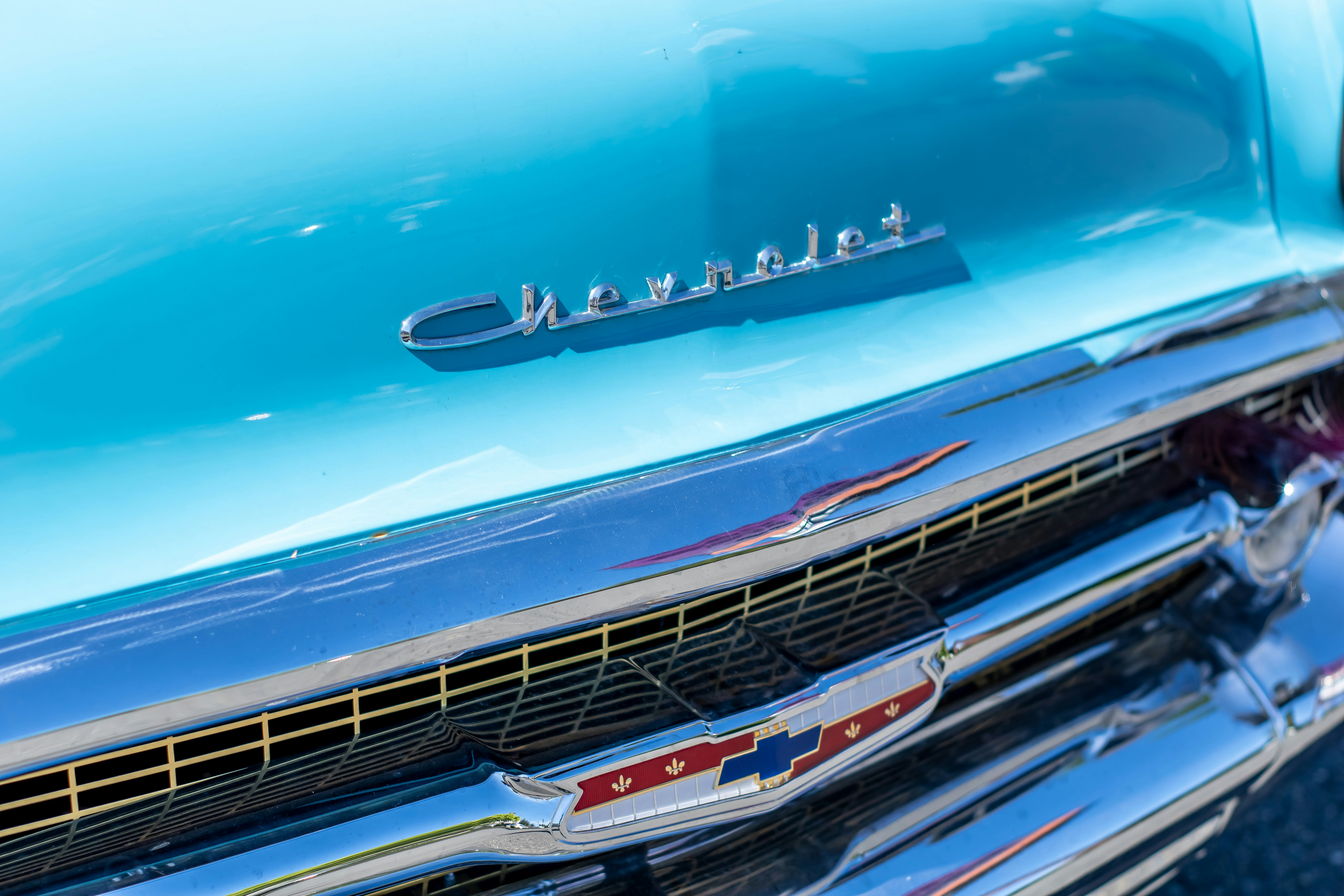 blue and silver chevrolet car