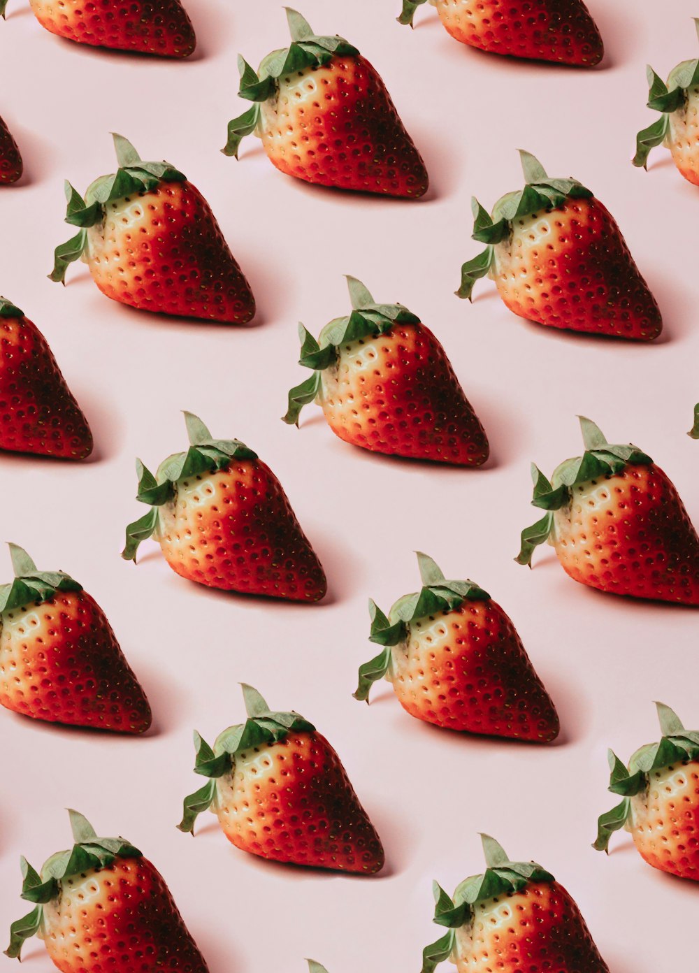 strawberries on white ceramic plate