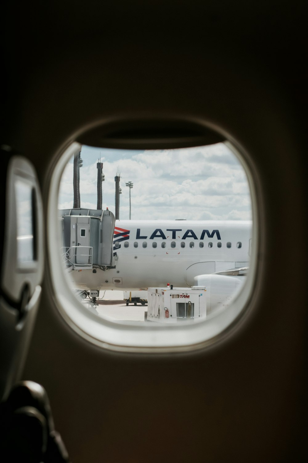 white airplane on airport during daytime