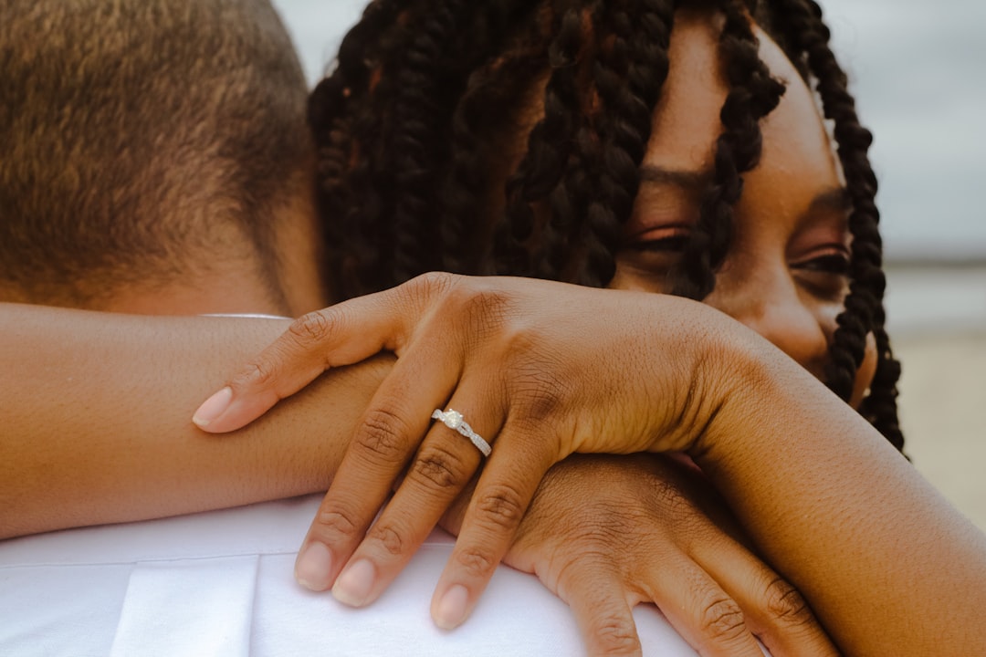 person wearing silver ring on left ring finger, Oasis of Serenity.