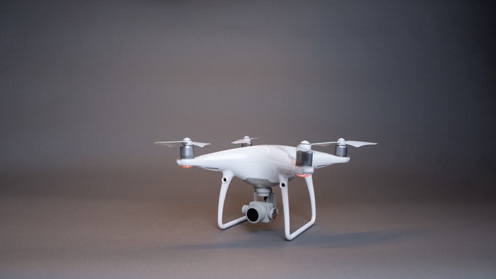 white drone on white table