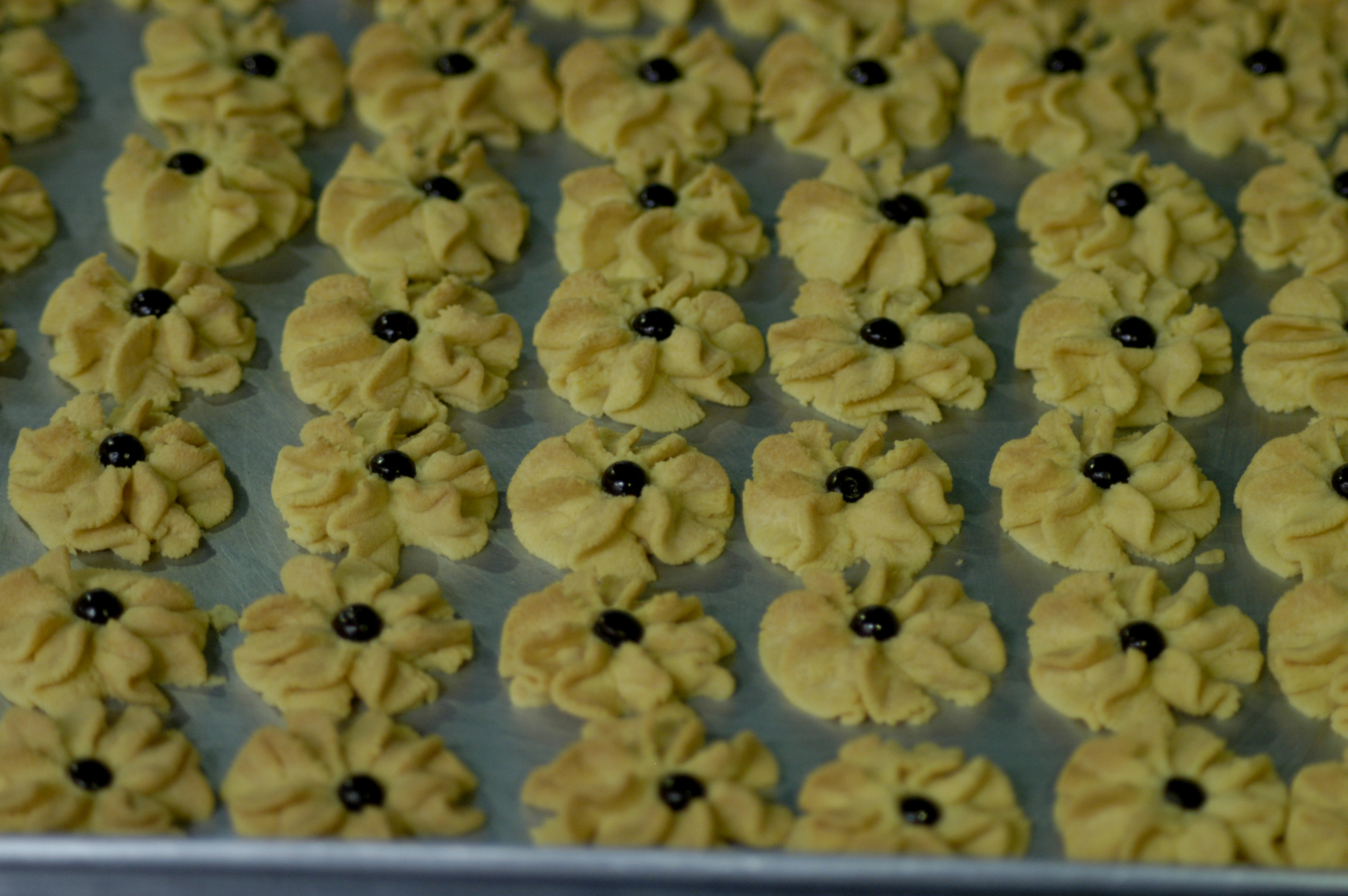 brown and black beads on white tray