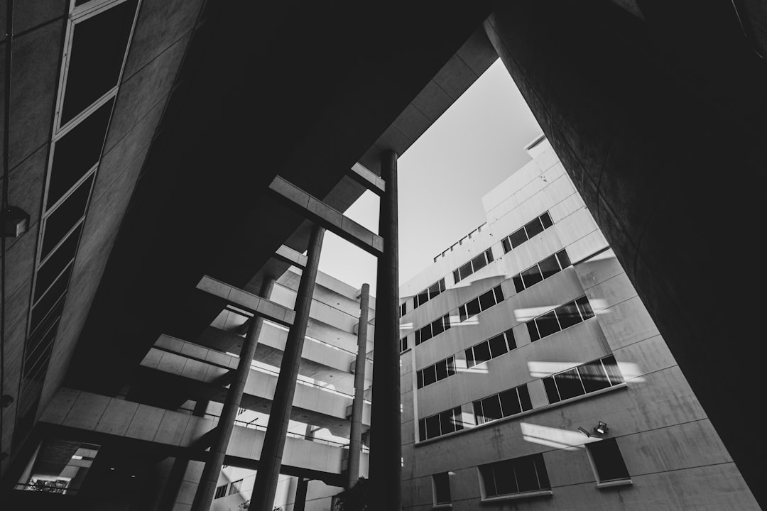 grayscale photo of concrete building