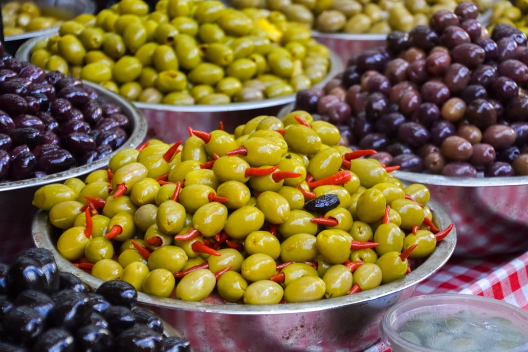 green and red grapes on stainless steel bowl