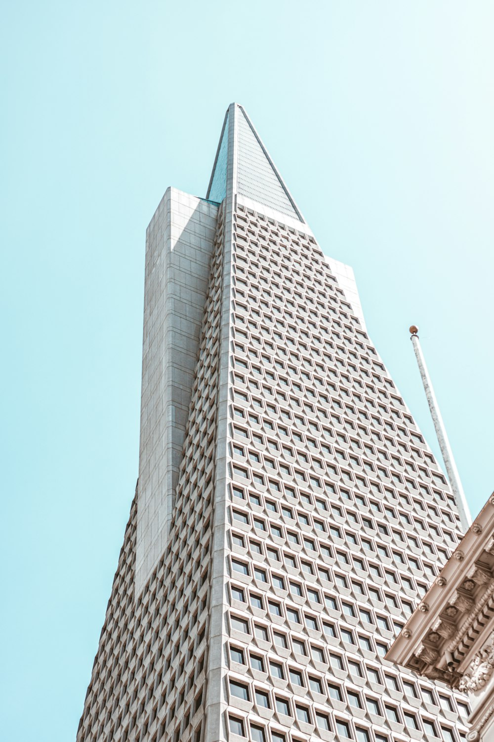 low angle photography of gray concrete building