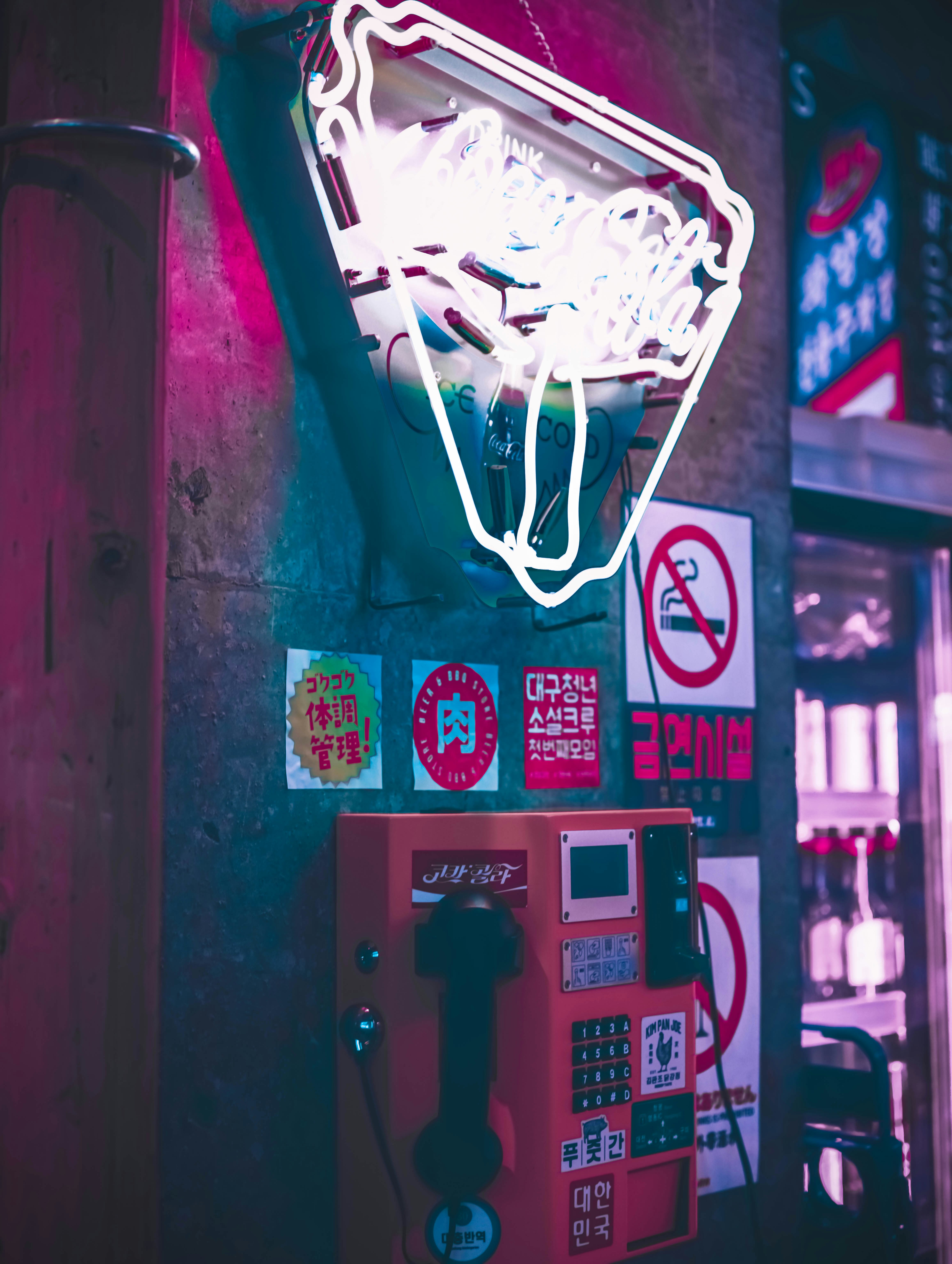 red and white coca cola vending machine