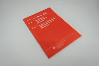 red book on white table