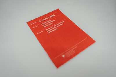 red book on white table