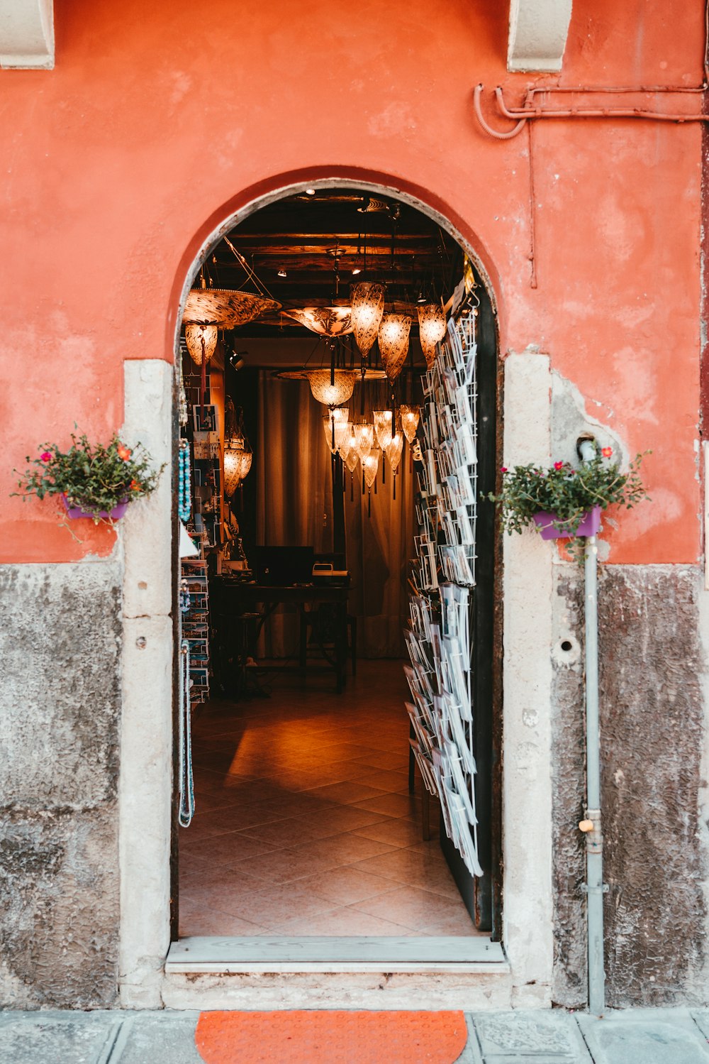 brown wooden door on brown brick wall