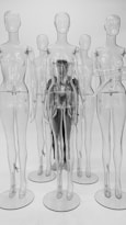 clear glass bottles on white surface