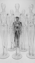 clear glass bottles on white surface