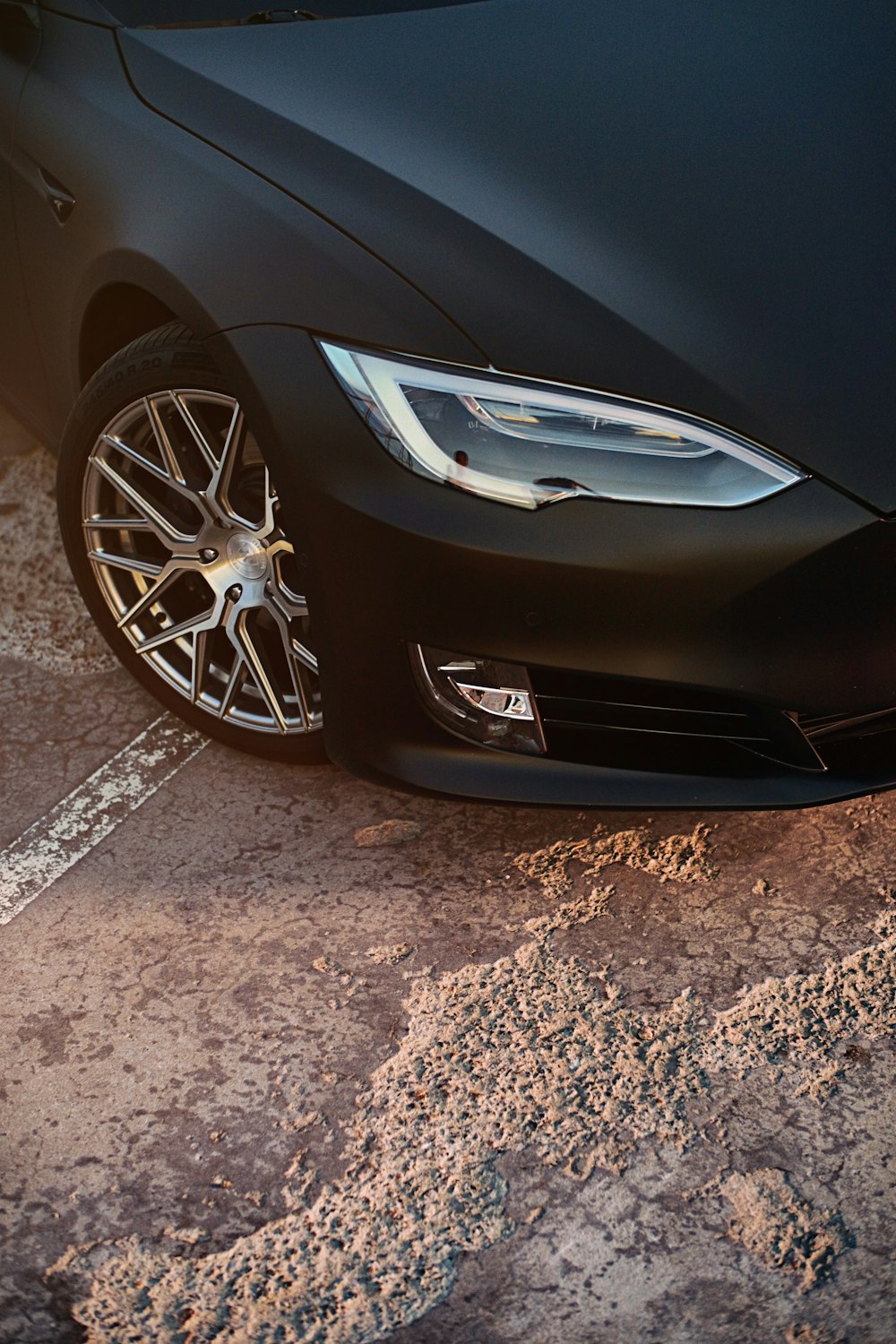 silver car on gray concrete road