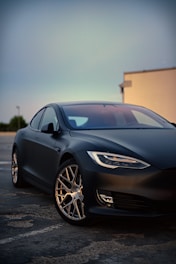 black mercedes benz coupe on road during daytime