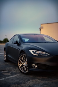 black mercedes benz coupe on road during daytime