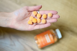 orange and white labeled prescription bottle
