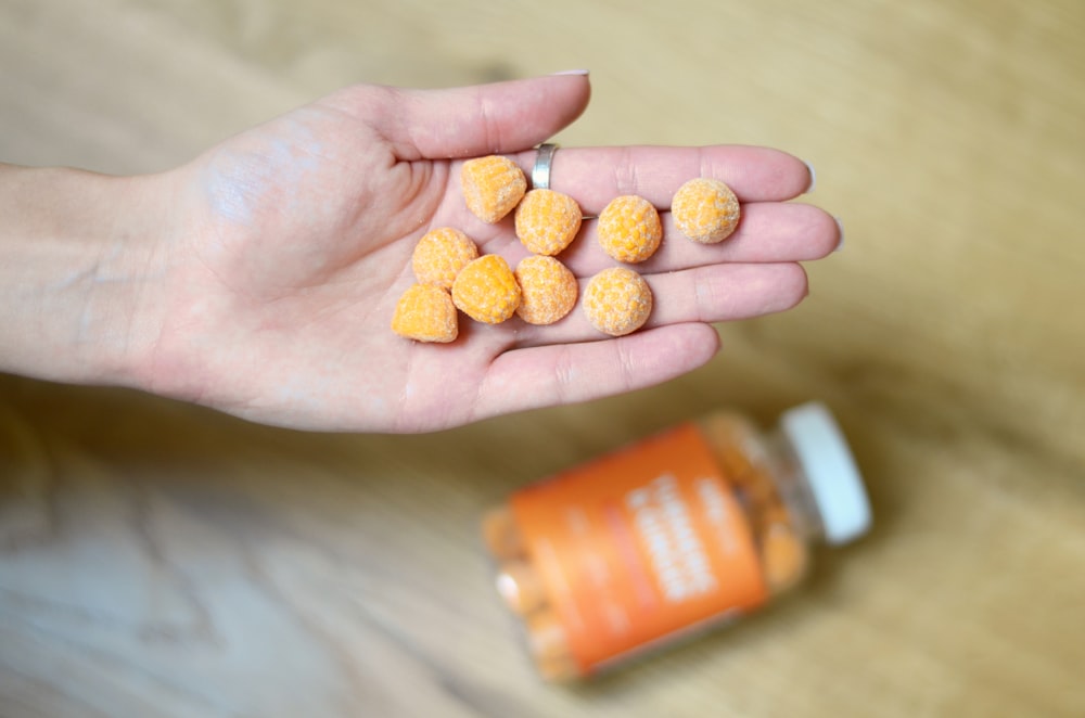 orange and white labeled prescription bottle