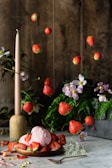 red strawberries on white ceramic plate