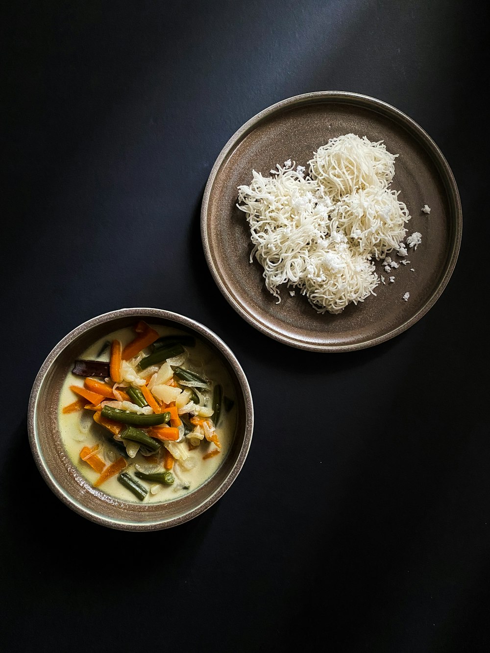 white rice in stainless steel bowl