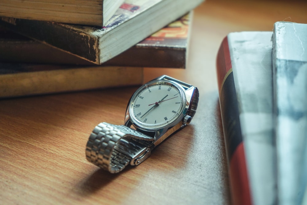 silver link bracelet round analog watch