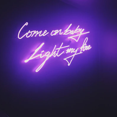 Elegant typography on a soft background reading 'Ignite Your Spark' with subtle floral accents.