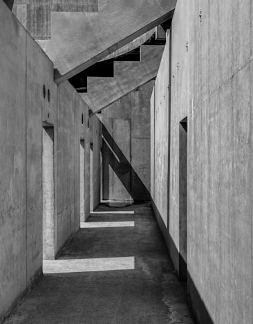 grayscale photo of concrete stairs