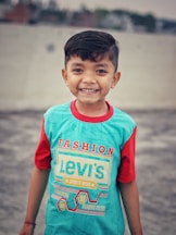 boy in red crew neck t-shirt