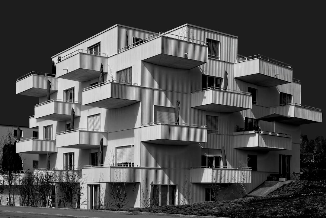 grayscale photo of concrete building