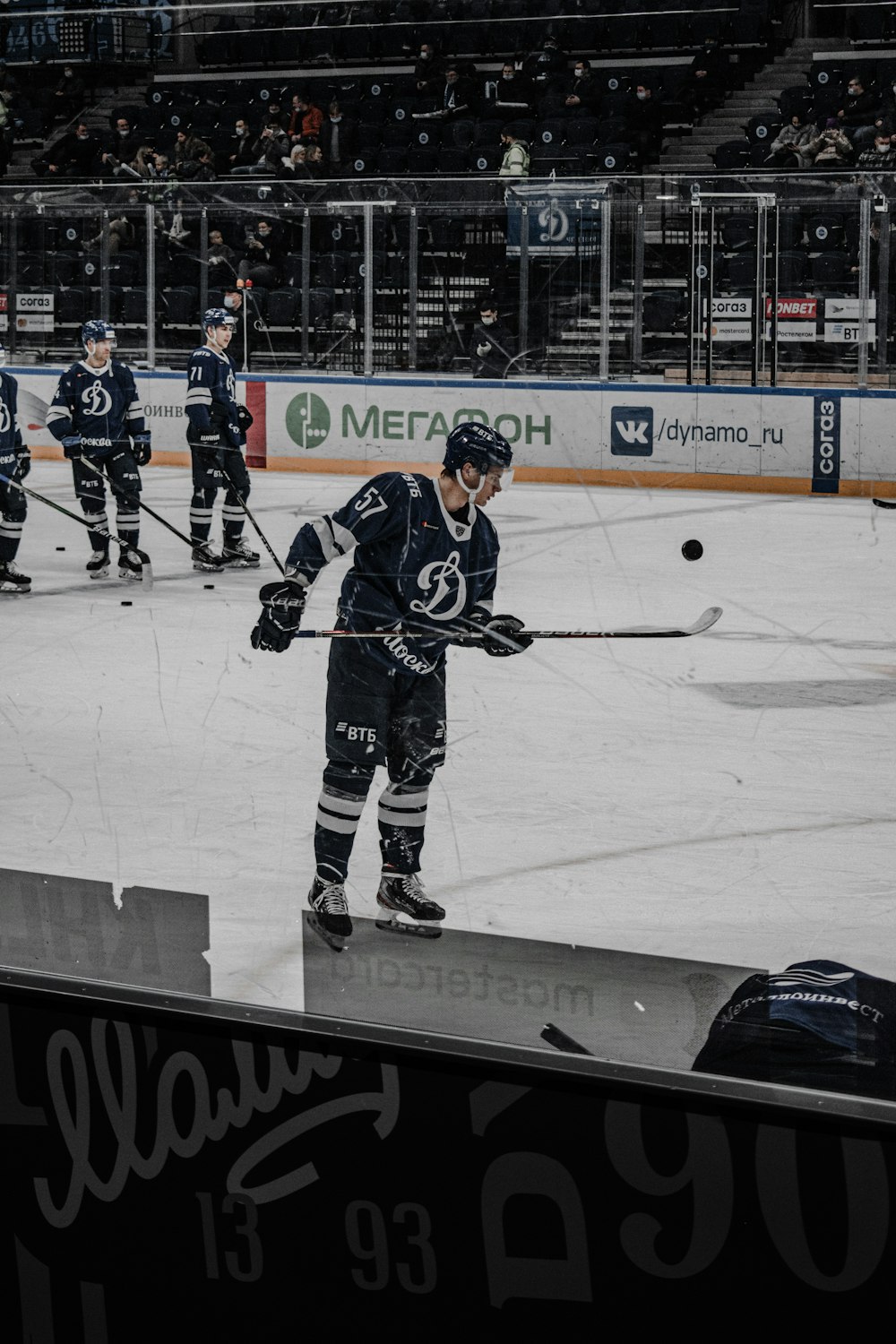 ice hockey players on ice hockey field