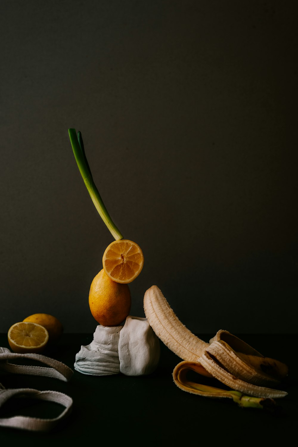 sliced lemon fruit on brown wooden chopping board