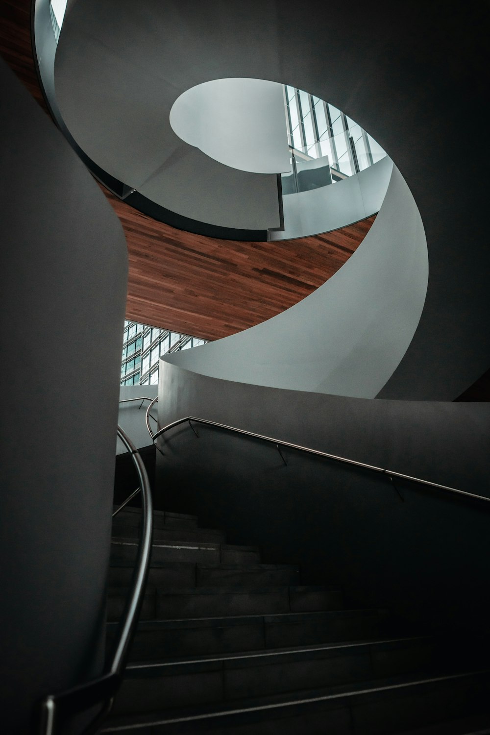 white and brown spiral staircase