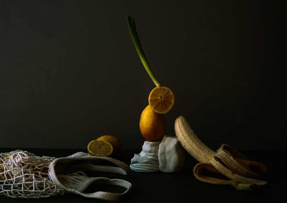 yellow banana fruit on black table