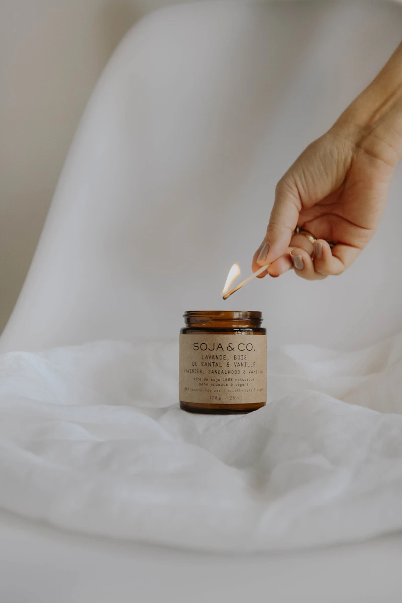 Hand-poured soy candle in amber glass jar