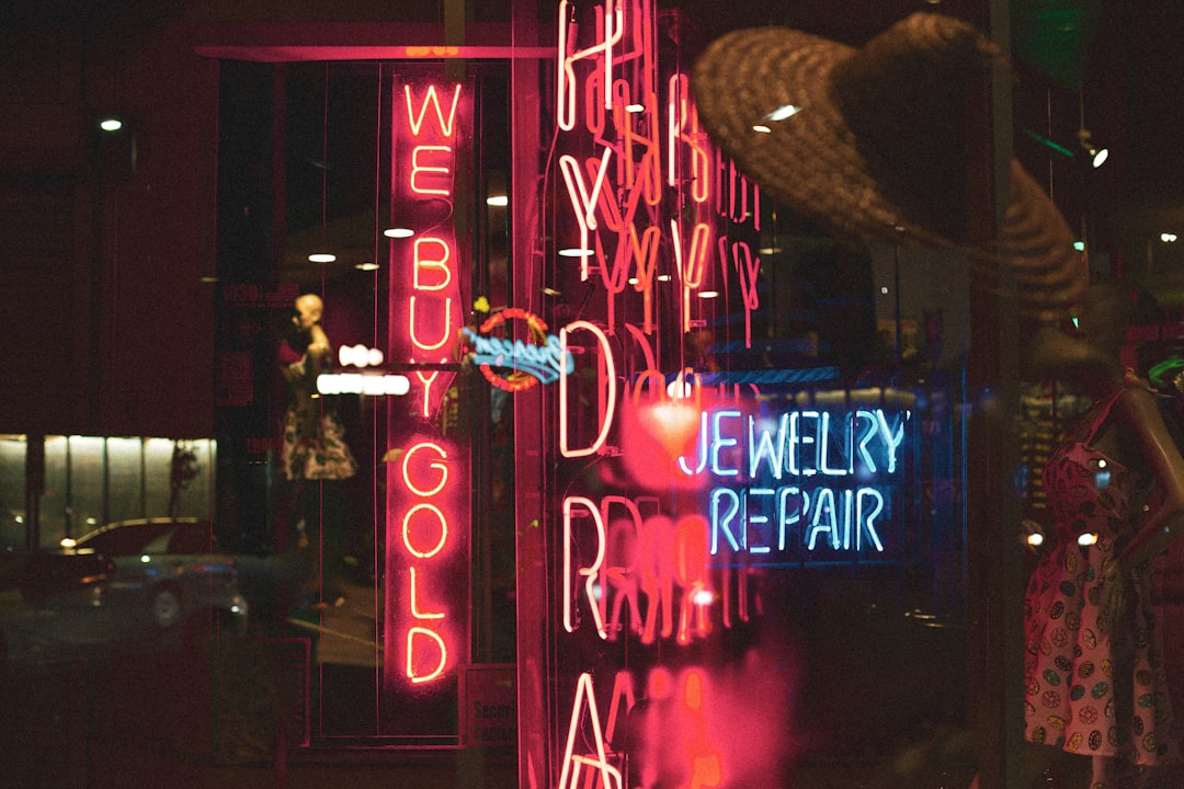 purple and pink love me neon light signage