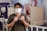 man in gray crew neck t-shirt wearing white face mask