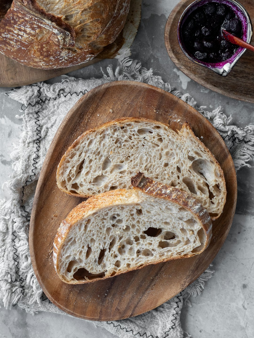 bread on brown wooden round tray