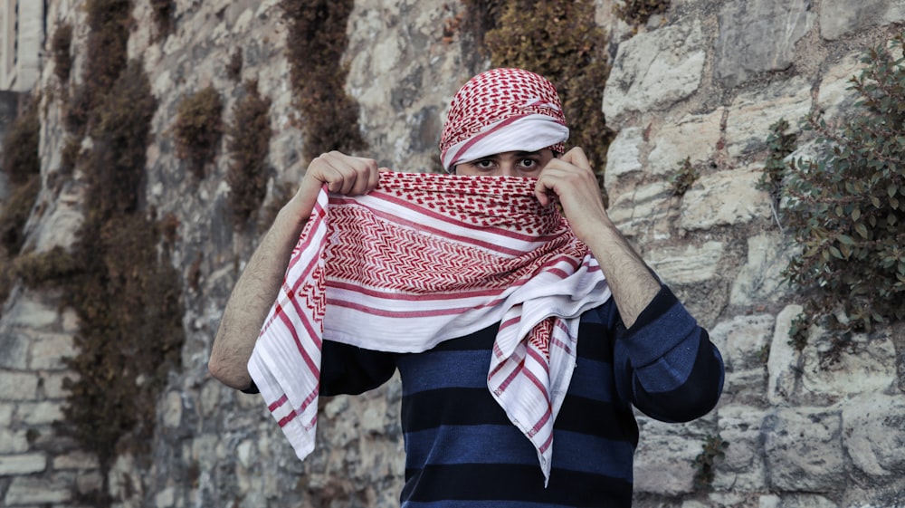 woman in blue white and red hijab