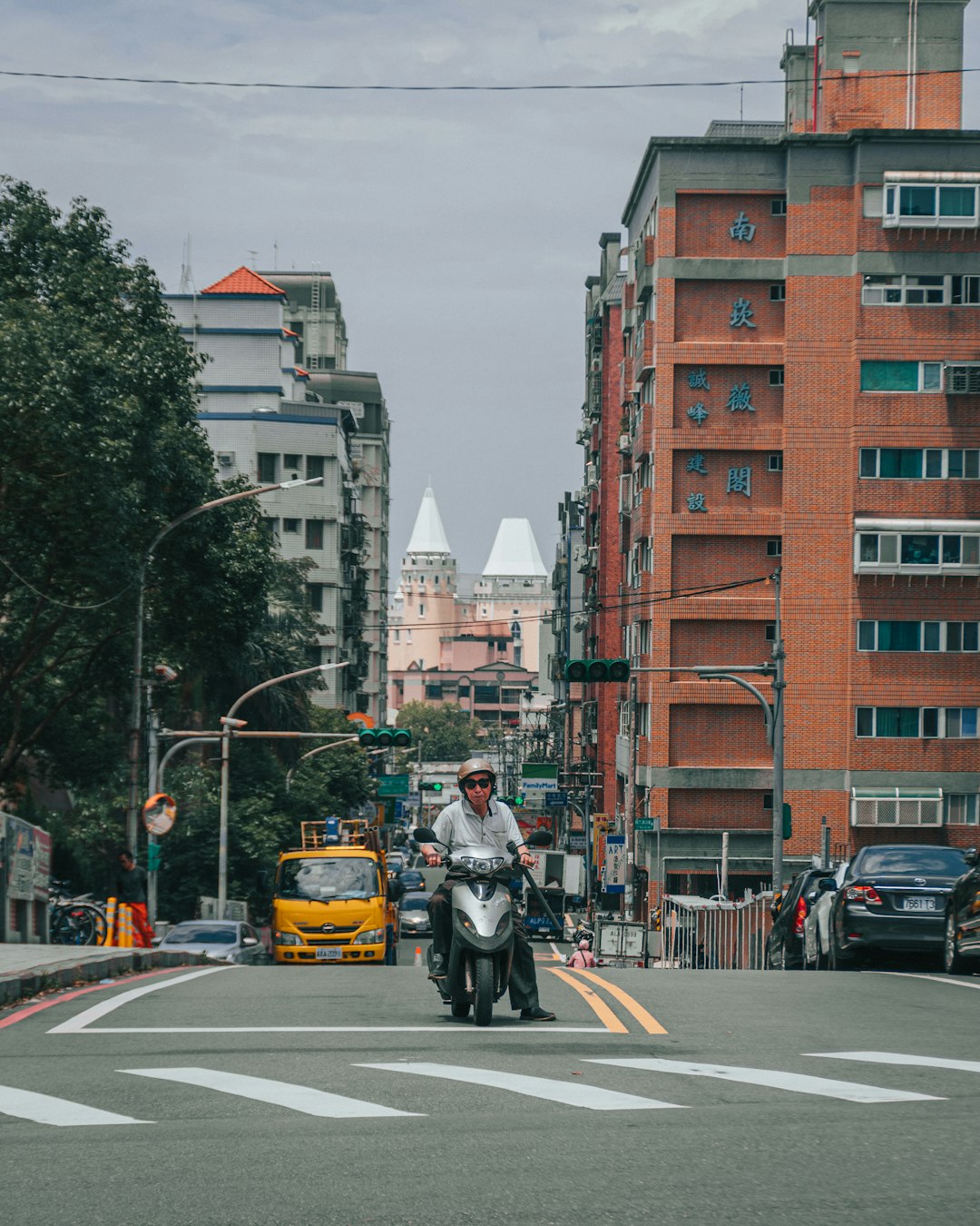 man in black jacket riding motorcycle on road during daytime