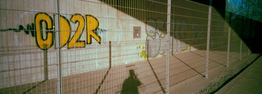 white and yellow wall graffiti