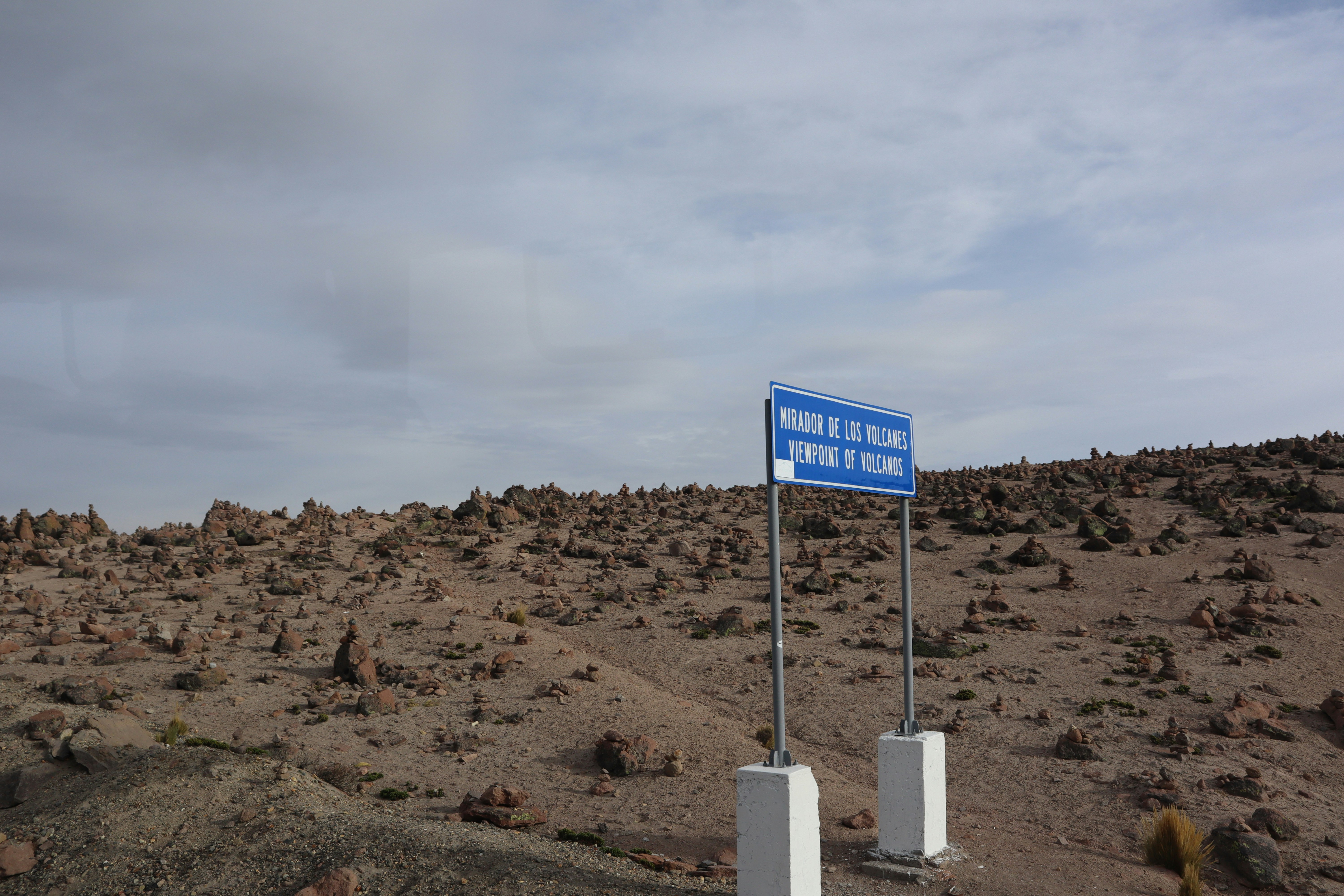 blue and white road sign