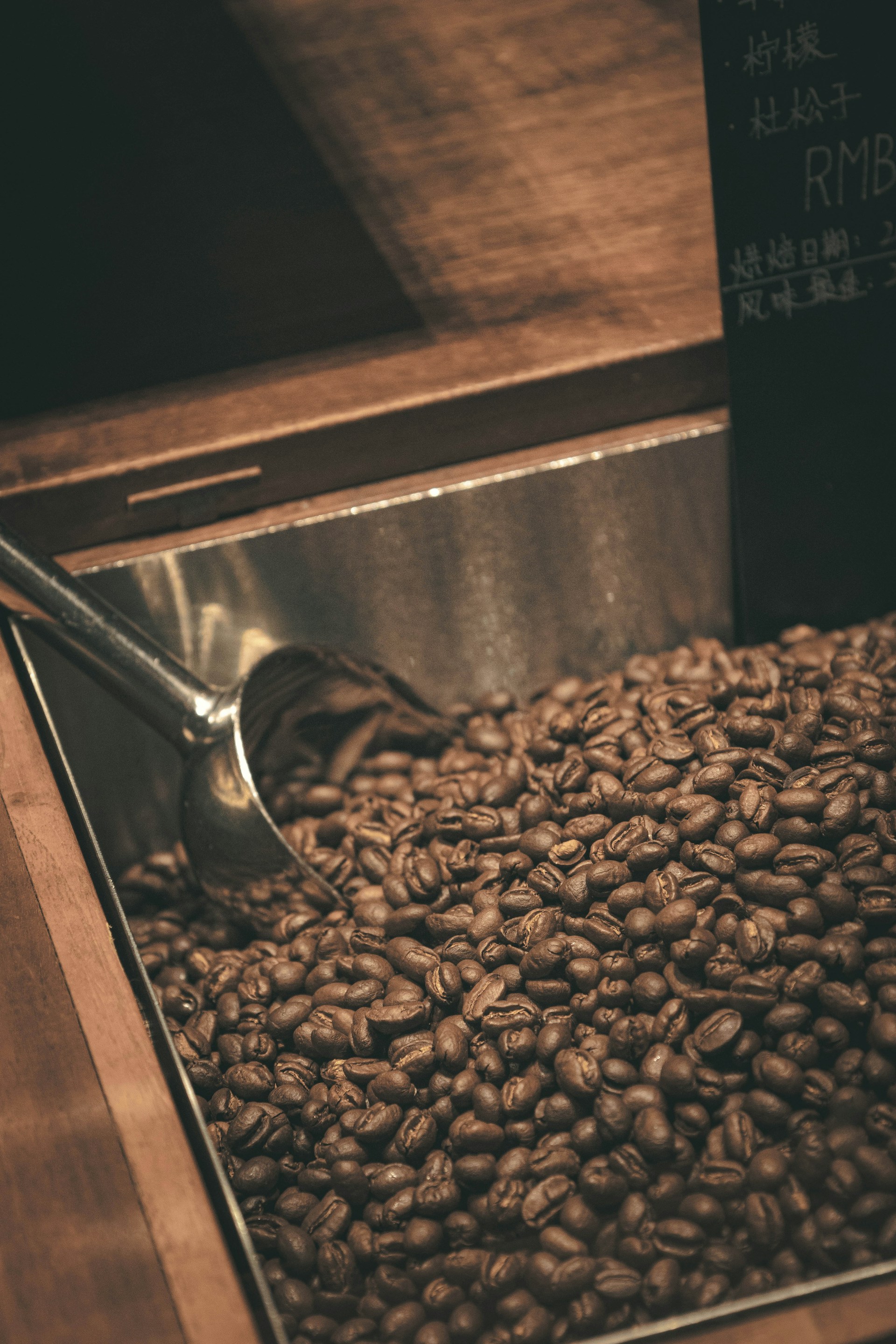 coffee beans on stainless steel cup