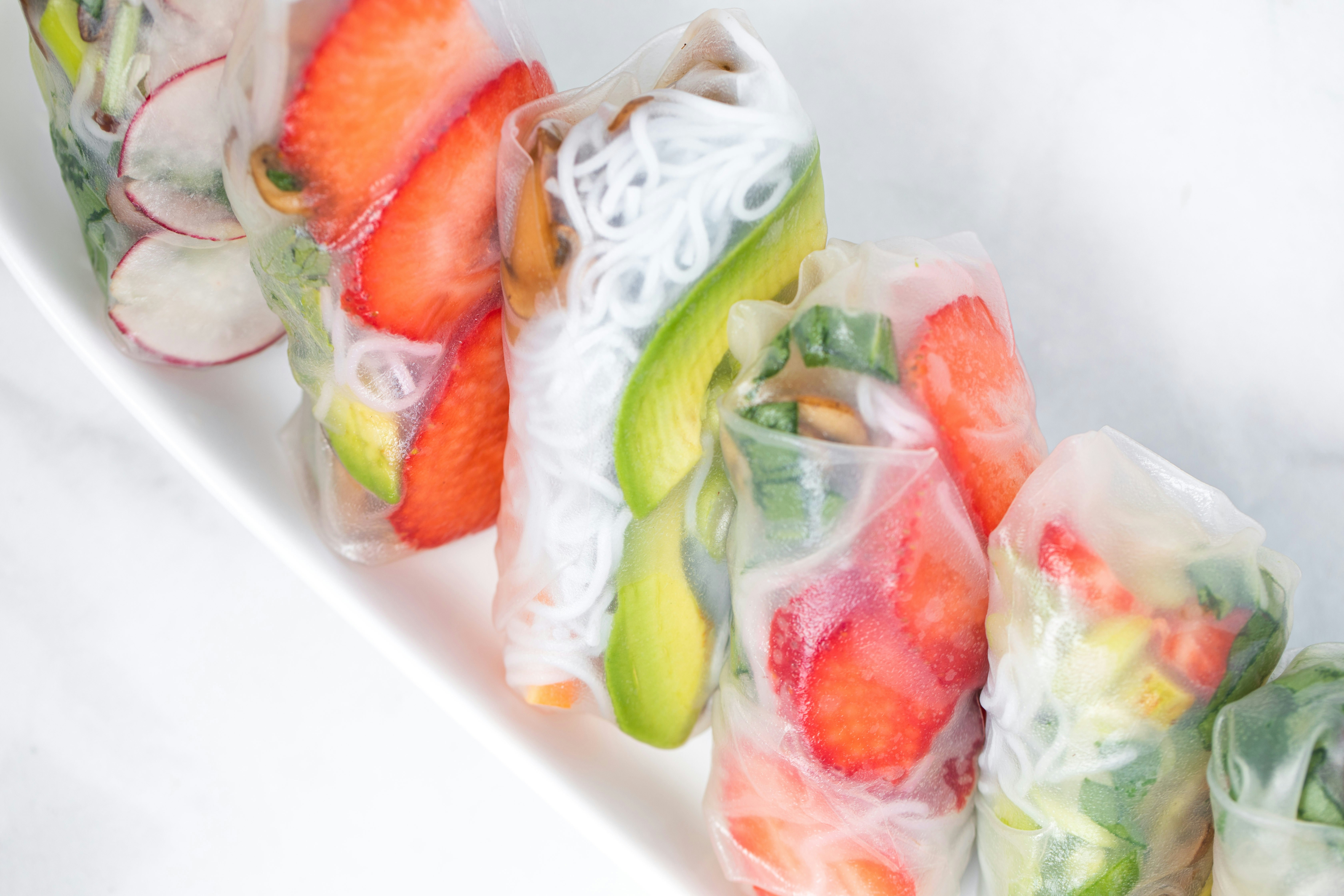 Fruit rice paper rolls with strawberry and avocado