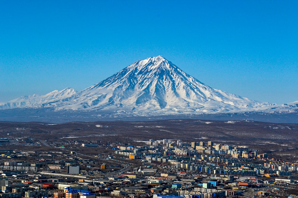 white and black mountain under blue sky during daytime