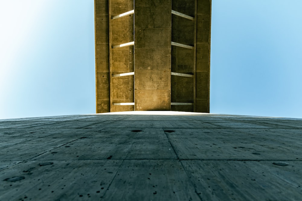 brown concrete building under blue sky during daytime