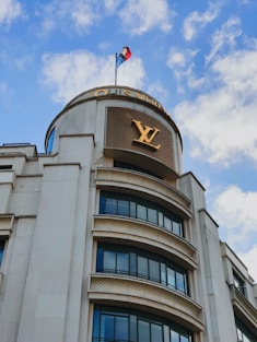 white and brown concrete building under blue sky during daytime