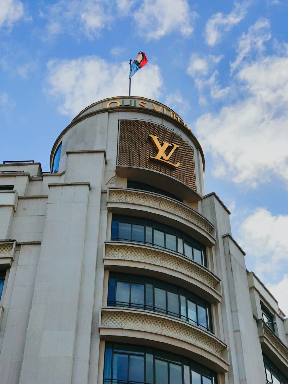 Louis vuitton maison champs elysees hi-res stock photography and